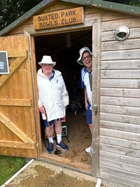 Captain Denzil and Barry Dowding taking shelter v Haywards Heath, 27 June